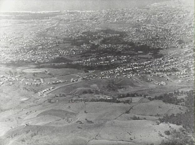 An aerial view of Edmund Rice College and Shephard's oval in the 1950's Mt Keira